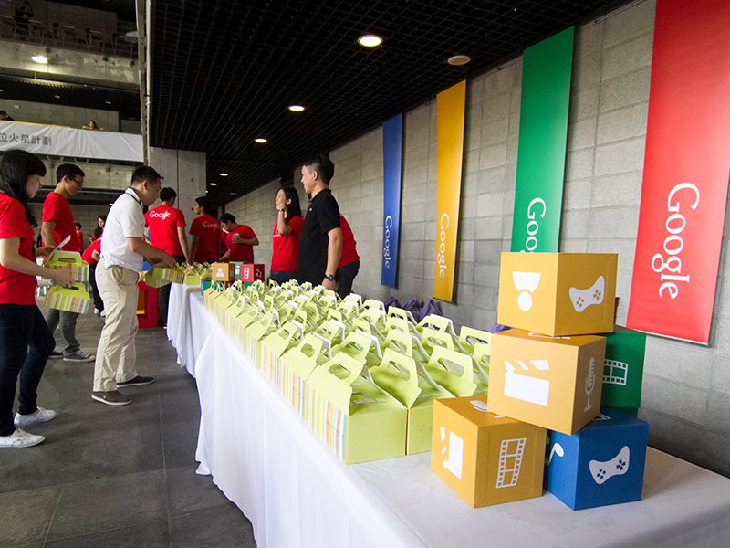 A Google event registration desk and giveaways